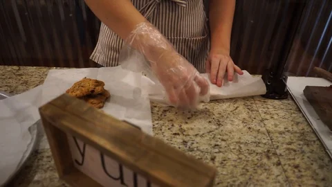 Cookies being packaged at bakery Stock Footage 91996574