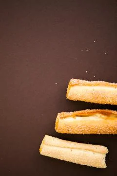 Cookies on the dark brown background with copy space for your text Stock Photos