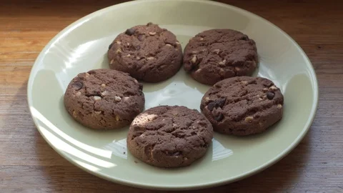 Cookies disappearing from the plate Stock Footage 85483927
