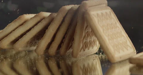 Cookies fall on a mirror surface Stock Footage 199022027
