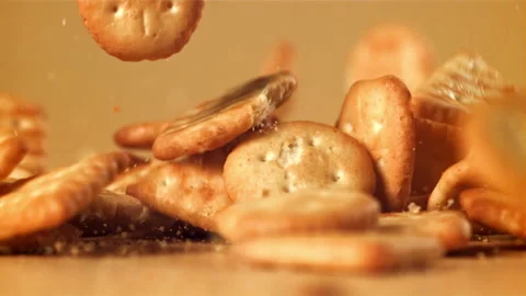 The cookies fall on the table. Filmed on a high-speed camera at 1000 fps. Stock Footage 264786567