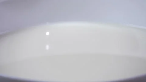 Cookies falling into milk 500fps Видео 130453550