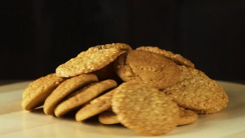 Cookies falling on the table. slow motion. Stock Footage 93083292