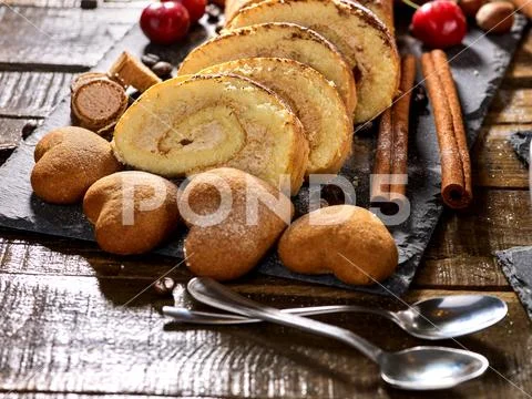 Cookies heart shape, sand rolled biscuit and cinnamon stick Stock Photos