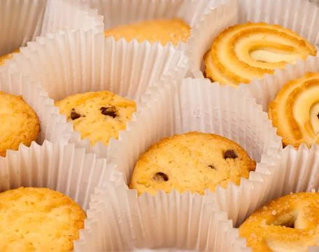 Cookies in a paper wrapper Stock Photos