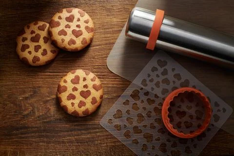 Cookies with a pattern in the shape of hearts, cookie cutter, stencil, baking 스톡 사진