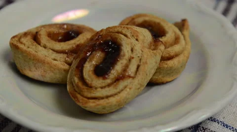 Cookies rotating on a white plate Stock Footage 58010656