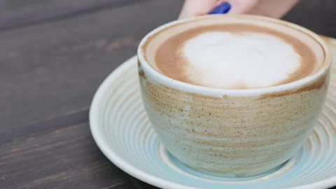 Cookies Served on a Patterned Plate with Cappuccino in a Turquoise Vintage Cup Stock Footage 327657987