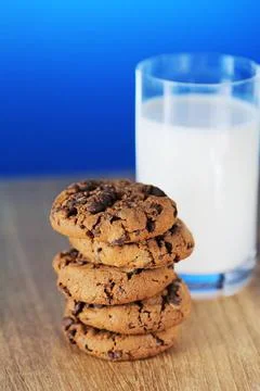Cookies Stack of chocolate chip cookies and a glass of milk. Short depth-o... 스톡 사진