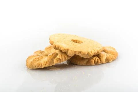 Cookies on a table with white background and the reflection Stock Photos