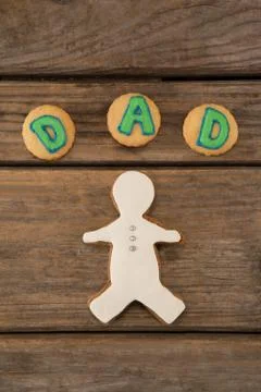 Cookies with text dad on table Stock Photos