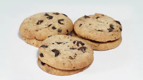Cookies on white turning close up Stock Footage 33731850