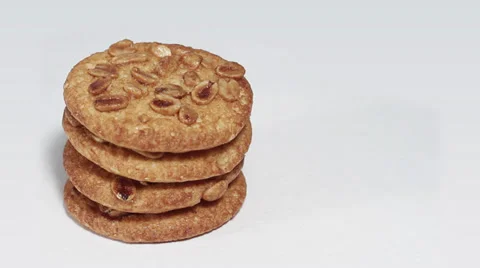 Cookies on white turning close up Stock Footage 33731860