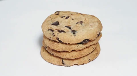 Cookies on white turning close up Stock Footage 33732064