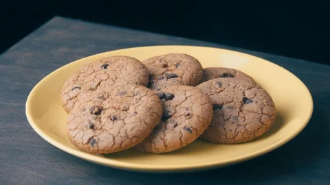 Cookies On A Yellow Plate Stock Footage 108429136