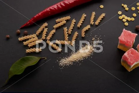 Cooking abstraction on black background Stock Photos