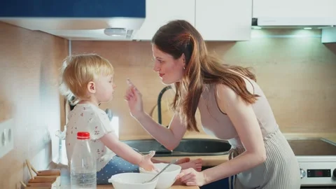 Cooking activity with child in modern kitchen at home Stock Footage 307126809