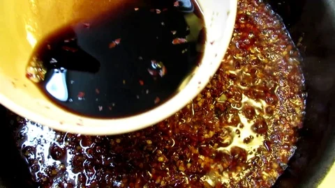 Cooking, adding soy sauce to make chili sauce, stir fry Stock Footage 112680283