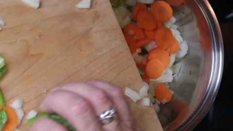 Cooking: Adding Vegetables to hot pan Video stock 278348241