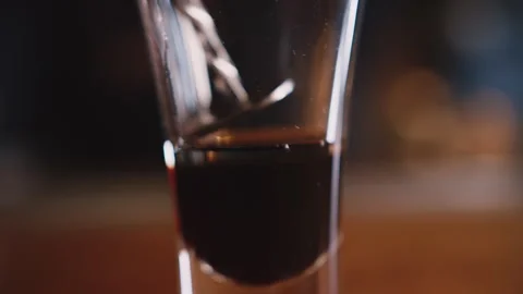 Cooking an alcoholic shot close up Stock Footage 252647200