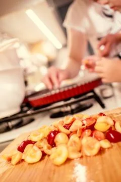 Cooking and baking cherry pie with almond slices Stock Photos