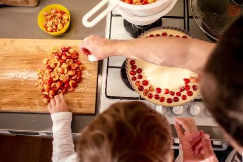Cooking and baking cherry pie with almond slices Stock Photos