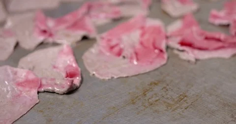 Cooking and chopping an authentic Philly Cheesesteak on a restaurant griddle Stock Footage 85039235