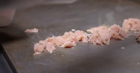 Cooking and chopping an authentic Philly Chicken Cheesesteak on a restaurant Stock Footage 85043856