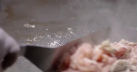 Cooking and chopping an authentic Philly Chicken Cheesesteak Stock Footage 85044814