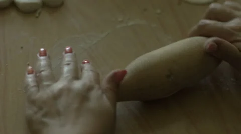 Cooking and home concept - close up of female working with rolling-pin Stock-Footage 65974587