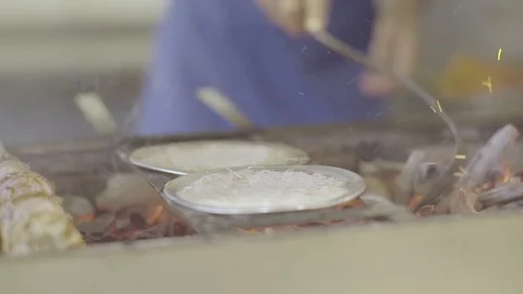 Cooking and serving turkish traditional desert kunefe in the kitchen Stock Footage 113484929