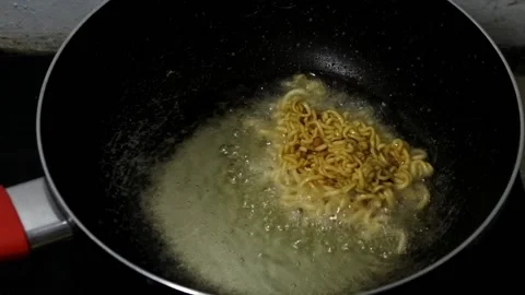 Cooking and serving very delicious noodles with egg Stock Footage 213488427