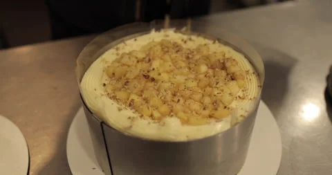 Cooking an apple pie, laying out sliced apples on a tart Stock Footage 252669682