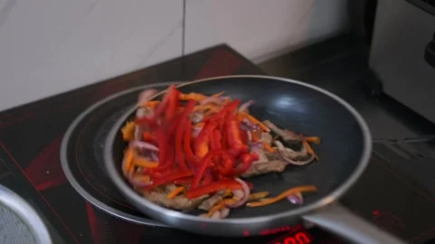 Cooking Asian dish stewing fried vegetables with beef meat in boiling oil Stock Footage 280489174