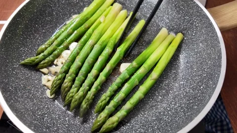 Cooking Asparagus Stock Footage 310433820