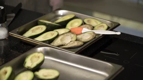 Cooking avocado at the kitchen Stock Footage 77233514