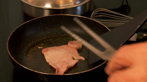 Cooking back bacon done Stock Footage 130797421