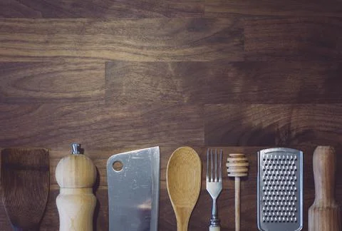 Cooking background frame. Kitchen utensils on a wooden table in the kitchen Stock Photos