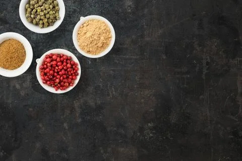 Cooking background with plates with different types of spices. Asian spices l Stock Photos