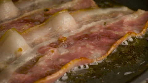 Cooking bacon Stock Footage 57304833