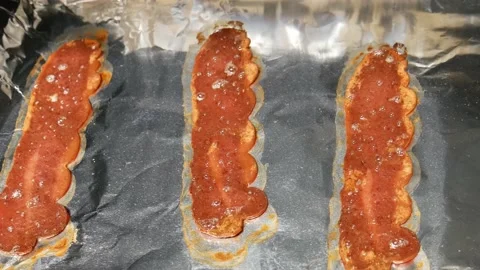 Cooking Bacon in the Oven Stock Footage 172259725