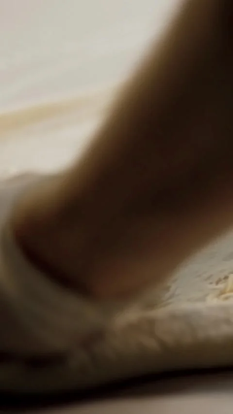 Cooking, bakery . close-up. the chef rolls out pizza dough blank on the Stock Footage 321055958