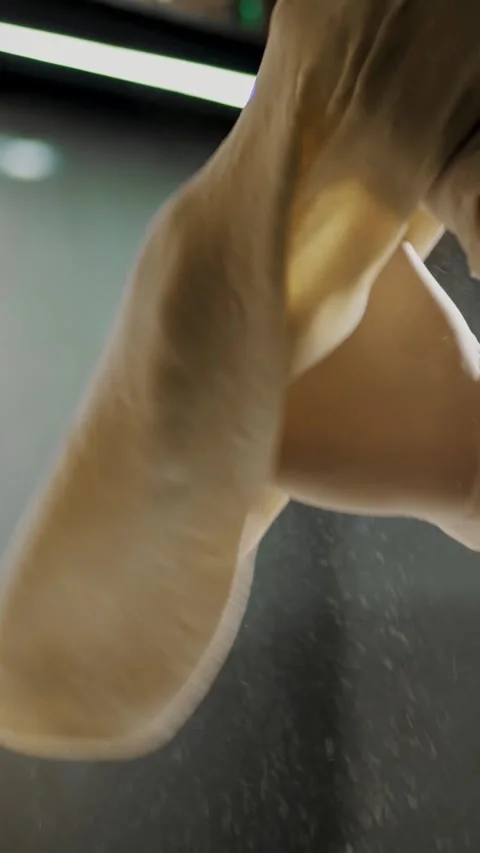 Cooking, bakery . close-up. the chef rolls out pizza dough blank on the Stock Footage 321599527