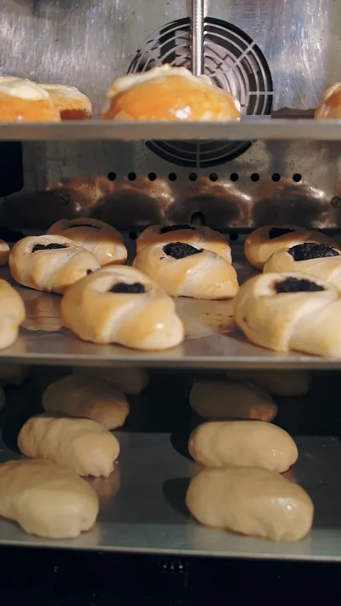 Cooking. bakery. culinary . Close-up. dough buns. raw yeast dough pies are baked Stock Footage 319292500