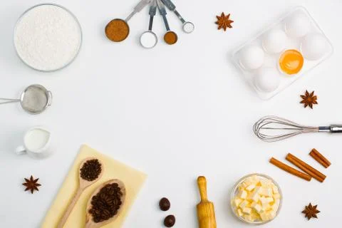 Cooking baking flat lay background with eggs butter kitchen tools Stock Photos