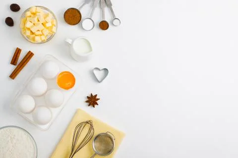 Cooking baking flat lay background with eggs butter kitchen tools Stock Photos