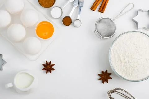 Cooking baking flat lay background with eggs flour kitchen tools Stock Photos