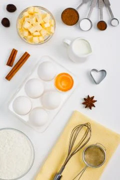 Cooking baking flat lay background with eggs butter kitchen tools Stock Photos