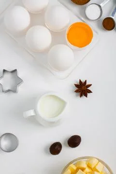 Cooking baking flat lay composition with eggs milk kitchen tools Stock Photos