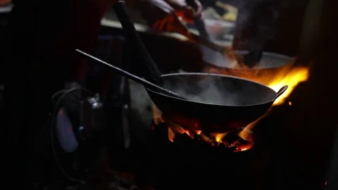 Cooking Bakmi Jawa using traditional stove and charcoal. Stock Footage